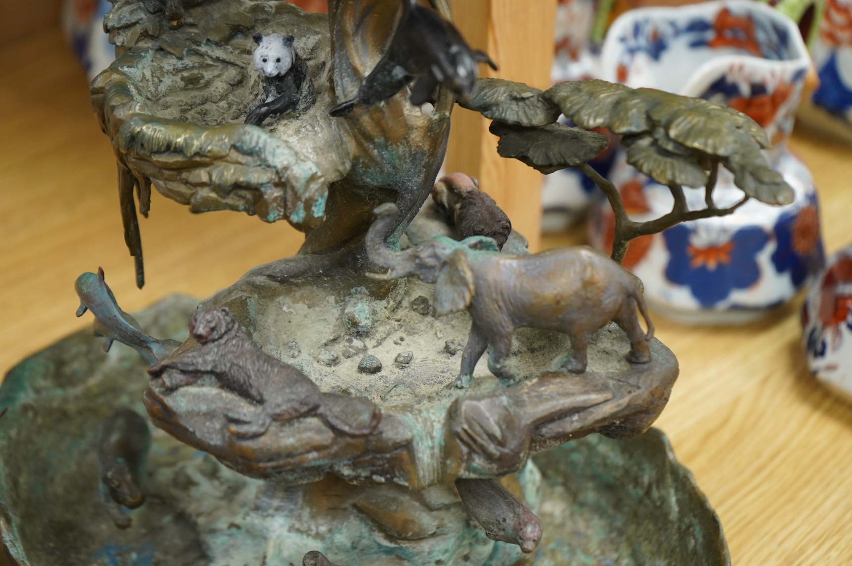 A Franklin Mint, decorative cast metal animal rockery, limited edition 1058/9500, 39cm high